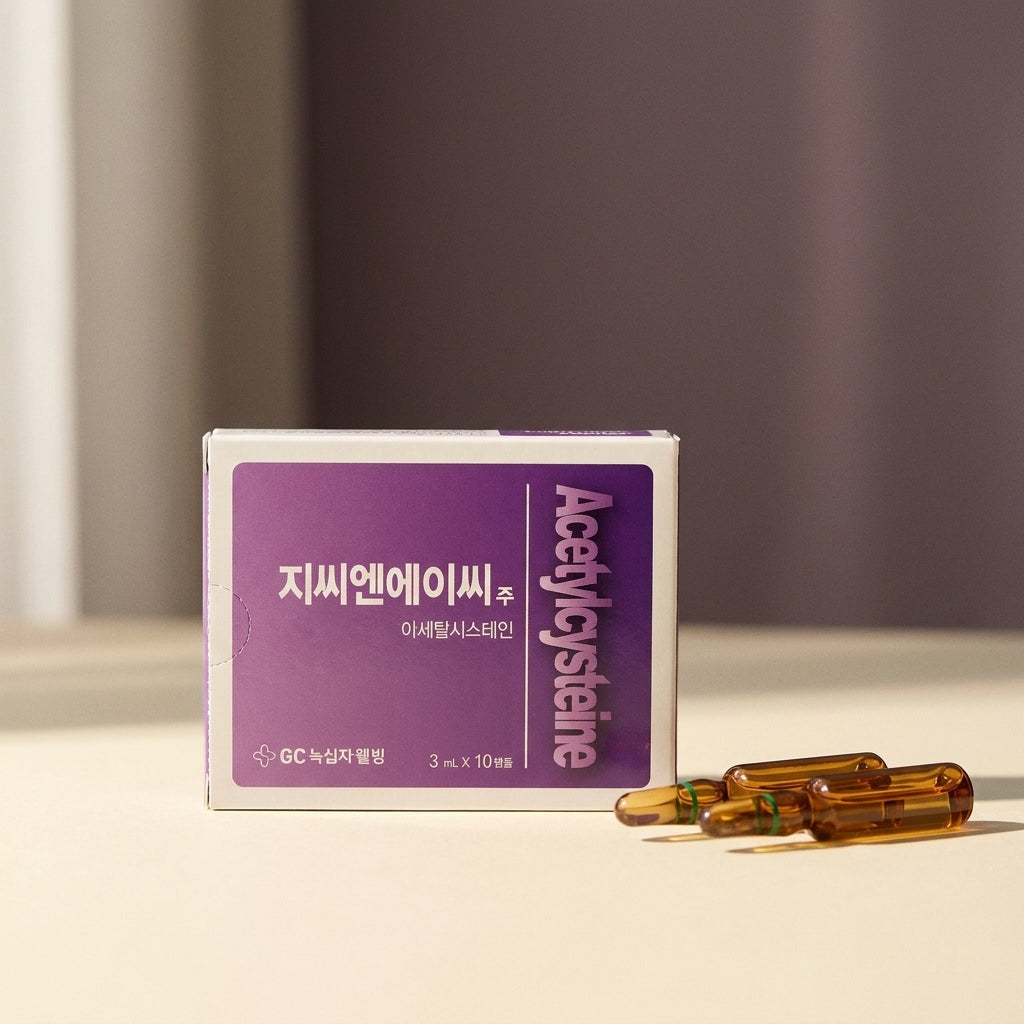 Acetylcysteine (NAC) box of 10 ampoules, 300mg per 3ml, on a cream surface